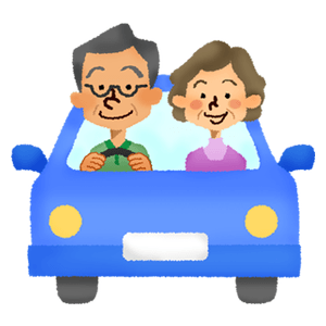 ドライブする年配の夫婦