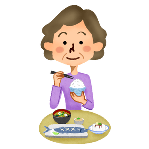 食事をする年配女性