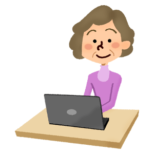 パソコンを使う年配の女性